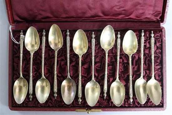 A cased set of twelve late 19th/early 20th century French silver gilt teaspoons, by Henri Souflot, Paris, 1884-1910, 5.8 oz.